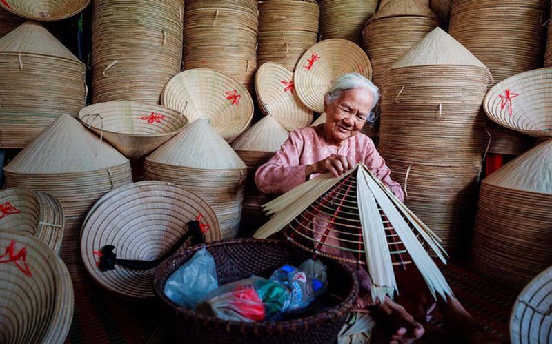 non la - pueblo del sombrero conico de vietnam